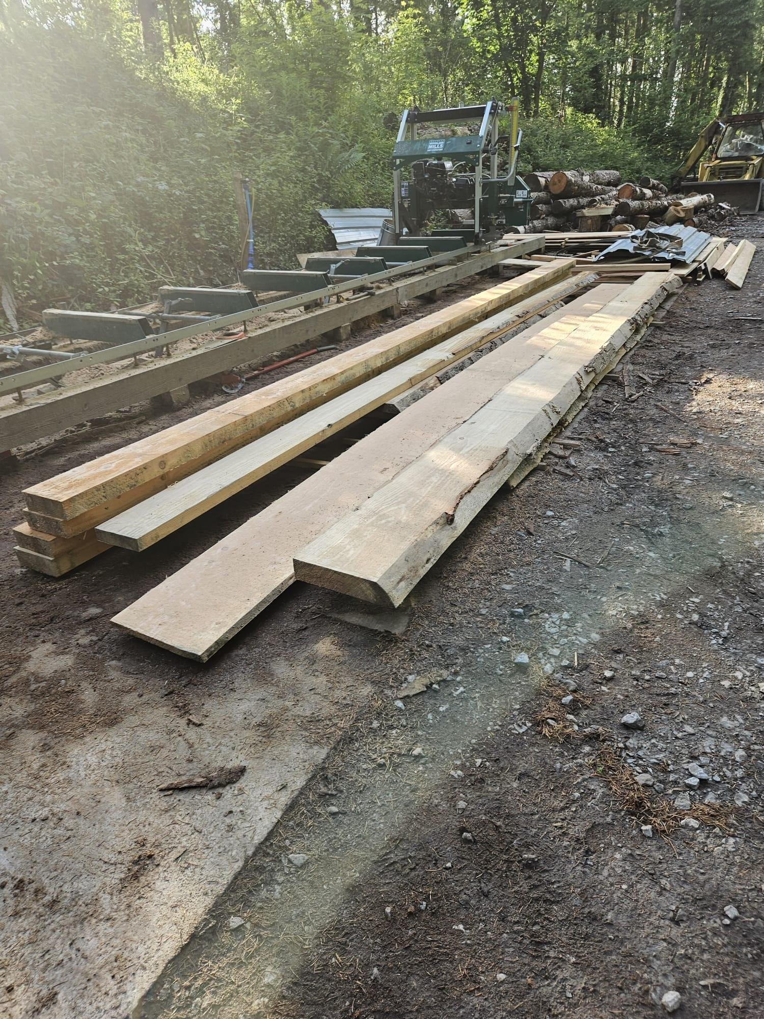 Timber milled on site with our Woodland Mills sawmill at Tree Tops and Train Tracks in North Wales