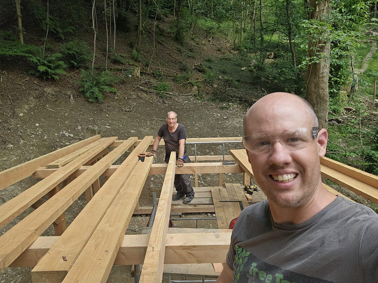 Building The Toad Hideout woodland cabin by hand using our own milled timber at Tree Tops and Train Tracks in North Wales