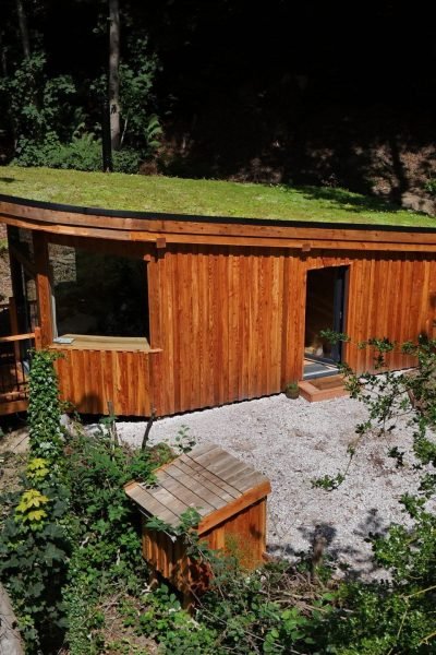 The Toad Hideout secluded woodland glamping cabin with a living roof in North Wales